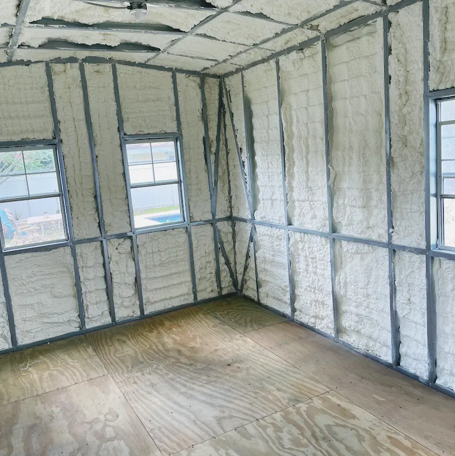 Closed-cell spray foam insulation applied to wall cavities in a residential project in Lincoln